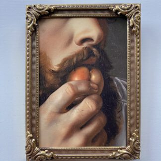A man bites an apricot