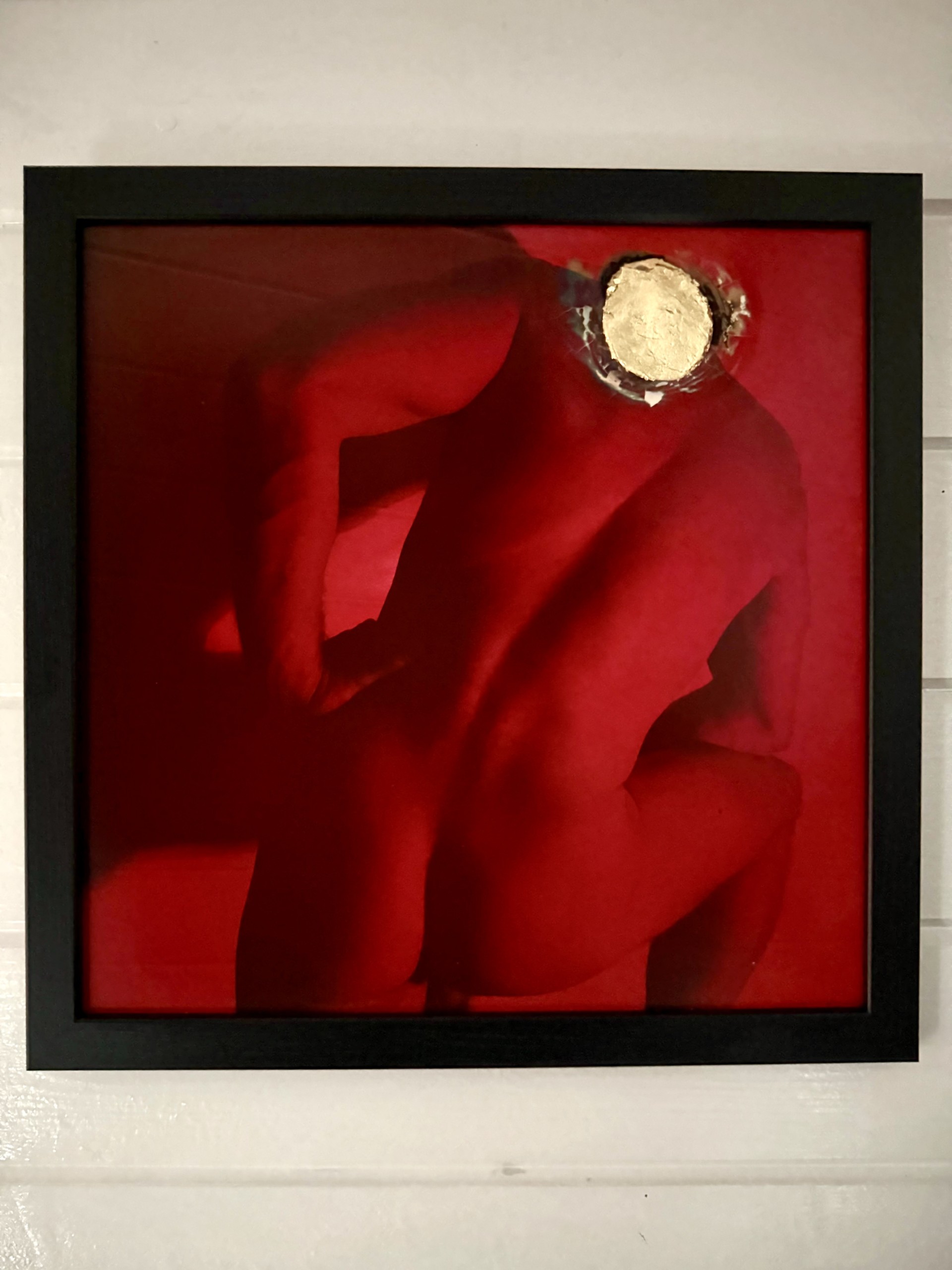 On the wall with frame